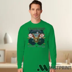 Male Model Wearing 2004 American League Championship Series New York Yankees Vs Boston Red Sox Men's Irish Green Long Sleeve in a minimalist gray office background. Styled with a casual long sleeve top.