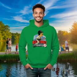 90s New York Yankees Don Mattingly Caricature Shirt 1 Male Model Wearing 90s New York Yankees Don Mattingly Caricature Men's Irish Green Hoodie in a gray office environment. Features a cozy pullover hoodie.