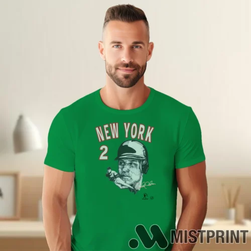 Male Model Wearing Derek Jeter 1996 New York Yankees #2 With Signature Fan Favorite Men's Irish Green T Shirt in a gray office environment. Features a classic crew neck tee.