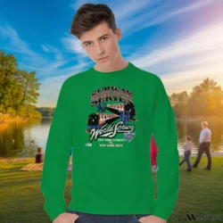 New York Mets Vs New York Yankees Subway Series Shirt 2 Male Model Wearing New York Mets Vs New York Yankees Subway Series Men's Irish Green Sweatshirt in a gray office environment. Styled with a relaxed fit sweatshirt.