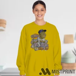 Female Model Wearing 90s Cartoon Mickey Mantle New York Yankees Women's Yellow Sweatshirt in a white office environment. Styled with a relaxed fit sweatshirt.