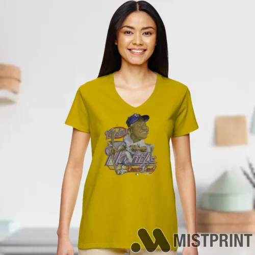 Female Model Wearing 90s Cartoon Mickey Mantle New York Yankees Women's Yellow V-neck in a white office environment. Features a classic V-neck cut.