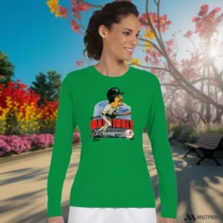 90s New York Yankees Don Mattingly Caricature Shirt 4 Female Model Wearing 90s New York Yankees Don Mattingly Caricature Women's Irish Green Long Sleeve in a minimalist gray office background. Styled with a casual long sleeve top.