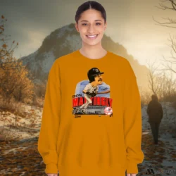 90s New York Yankees Don Mattingly Caricature Shirt 3 Female Model Wearing 90s New York Yankees Don Mattingly Caricature Women's Orange Sweatshirt in a white office environment. Styled with a relaxed fit sweatshirt.
