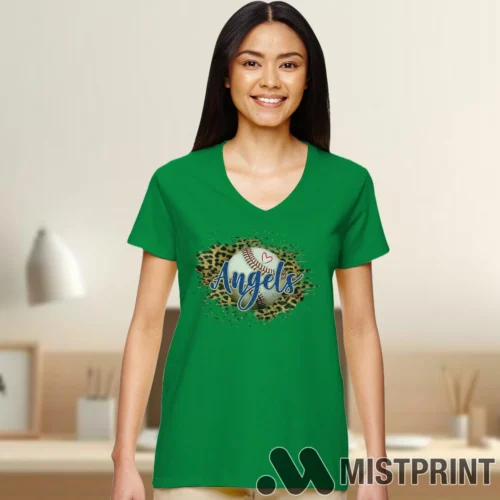 Female Model Wearing Baseball Los Angeles Angels Gift For Fan Women's Irish Green V-neck in a gray office environment. Features a classic V-neck cut.