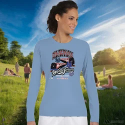 New York Mets Vs New York Yankees Subway Series Shirt 8 Female Model Wearing New York Mets Vs New York Yankees Subway Series Women's Light Blue Long Sleeve in a minimalist white office background. Styled with a casual long sleeve top.