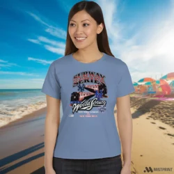 New York Mets Vs New York Yankees Subway Series Shirt 1 Female Model Wearing New York Mets Vs New York Yankees Subway Series Women's Light Blue T Shirt in a white office environment. Features a classic crew neck tee.